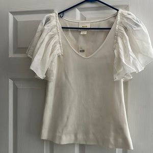 New with tags Anthropologie flared cream shirt